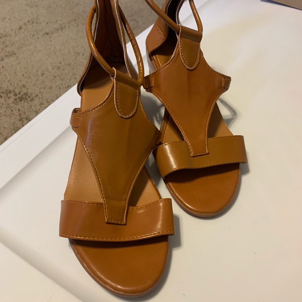 Brand New Women’s size 9 sandals. Never Worn, Tan/nude color.